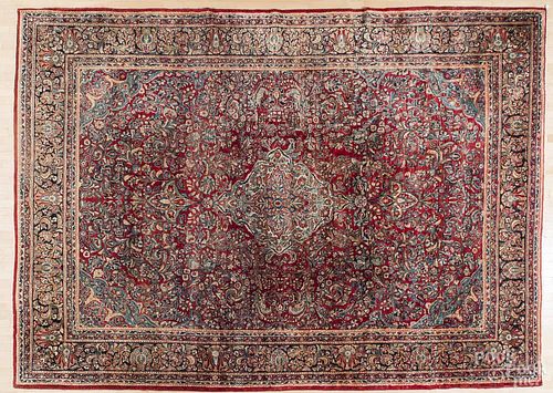 Sarouk carpet, ca. 1930, 14' 3'' x 10' 2''.