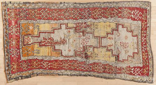 Turkish carpet, early 20th c., 7' 5'' x 4'.