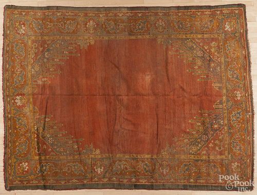 Oushak carpet, early 20th c., 10' x 7' 4''.