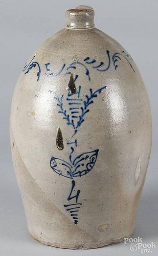 American four-gallon stoneware jug, 19th c., with cobalt floral and scroll decoration, 17 1/2'' h.