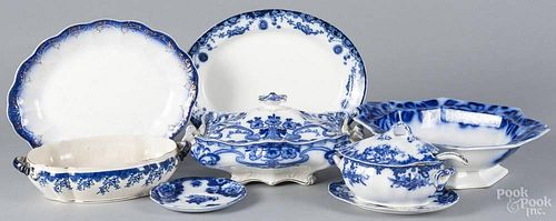 Nine pieces of flow blue porcelain, 19th c., to include covered vegetable dishes, etc.