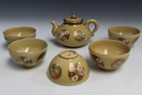 A Set of Japanese Porcelain Teapot and 5 Teacups.
