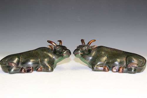 A Pair of Chinese Cloisonne Buffalo Stautes.