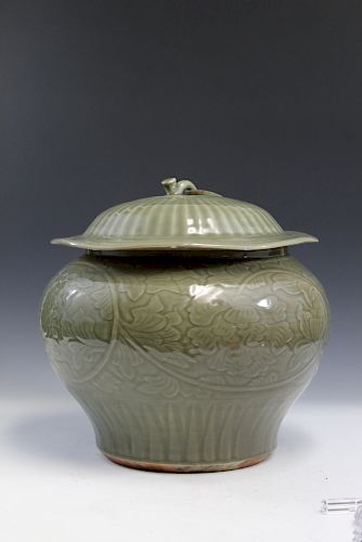Chinese celadon porcelain jar with lid. 
