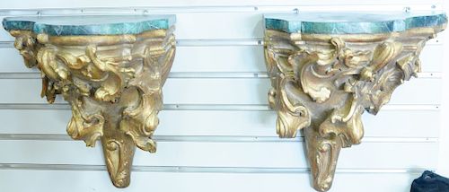 Pair of Italian carved wood hanging bracket shelves with painted faux malachite tops, Christie's label on back, ht. 16 1/2 in., wd. 15 1/2 in.