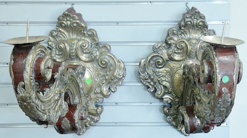 Pair of large candle sconces, having embossed silver plate shield form bracket with wrapped embossed silver plated arms holding pricket candle ends, h