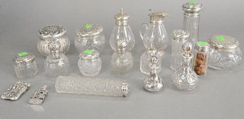 Eighteen piece lot of cut crystal with sterling silver tops. ht: 2 1/4" to 6 1/2"