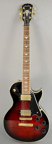 Tradition electric guitar, Les Paul model marked S2002, serial number 02120264, in fitted case.