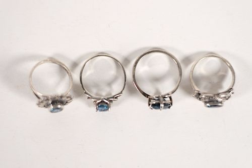 Group, 4 Sterling Silver & Blue Topaz Rings