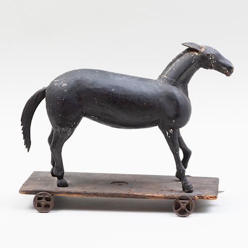 Black Painted Wood Model of a Horse on a Trolley, Possibly Continental