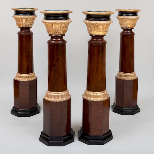Rare Set of Four Classical Mahogany, Ebonized and Parcel-Gilt Pedestal Urns, probably New York