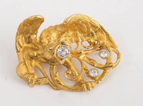 18K YELLOW GOLD AND DIAMOND GRIFFIN-FORM BROOCH