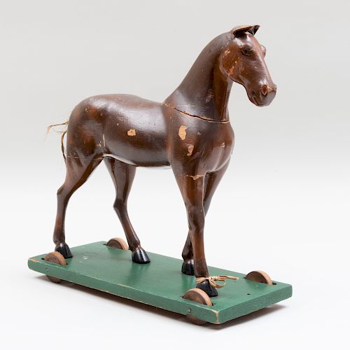 Painted Wood Model of a Toy Horse on a Wheeled Trolley