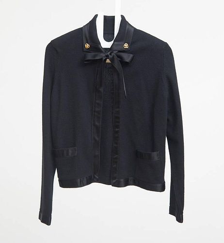 BLACK CARDIGAN WITH SILK NECKTIE AND CHANEL-TYPE COLLAR BUTTONS, LACKING LABEL, PROBABLY CHANEL