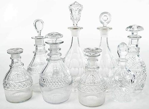 Eight Cut Glass Decanters with Stoppers