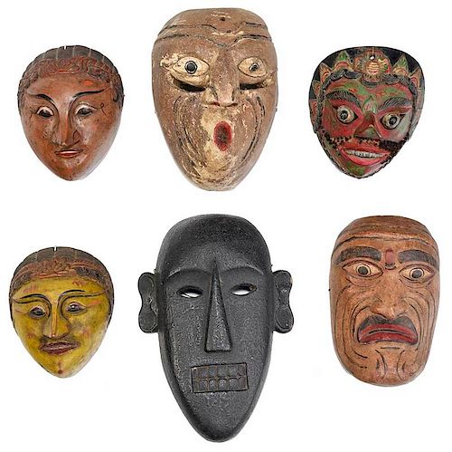 Group of Six Carved and Painted Indonesian Masks