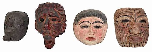 Four Latin American Painted Wood and Clay Masks
