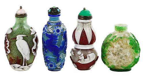 Four Double Overlay Carved Glass Snuff Bottles