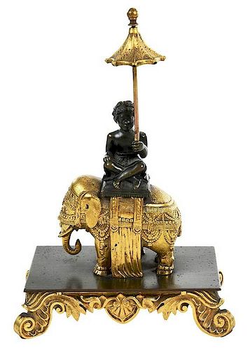 Patinated and Gilt Bronze Figure on Elephant