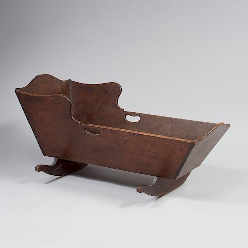CHIPPENDALE FIGURED CHERRYWOOD CRADLE, 
American, possibly New York State, circa 1770-1800

