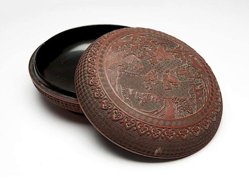 A Chinese carved cinnabar lidded box