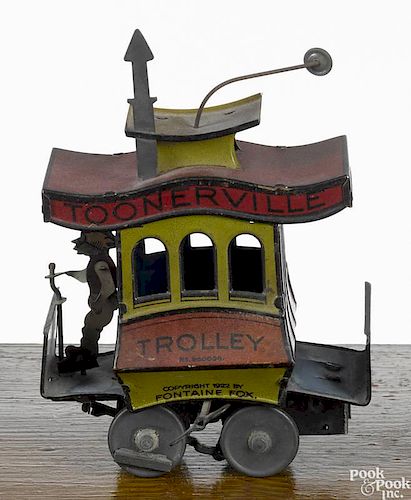 Nifty Fontaine Fox tin lithograph wind-up Toonerville Trolley toy, early 20th c., 7'' h.