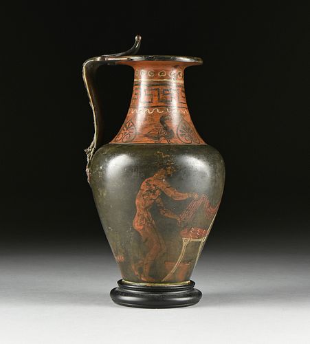 A ROMAN STYLE RED FIGURE POLYCHROME BRONZE OINOCHOE WINE VESSEL, POSSIBLY ALEXANDRIA, IN THE 1ST CENTURY BC/1ST CENTURY AD TASTE, 