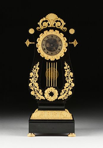 LOUIS PHILIPPE GILT BRONZE MOUNTED EBONY LYRE FORM MANTLE CLOCK, BY GILLION, PARIS, 1830-1848,