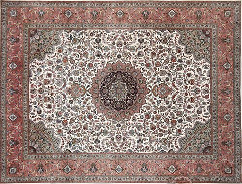 A LARGE TABRIZ COLORFULLY WOVEN WOOL CARPET, 20TH CENTURY,