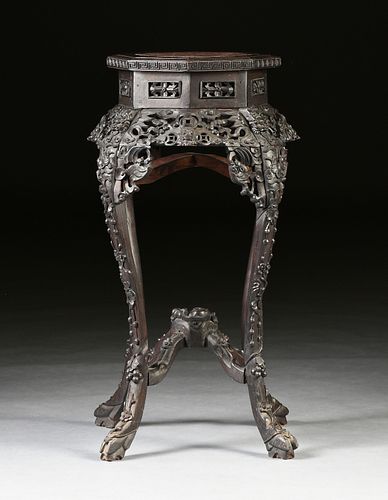 A CHINESE REPUBLIC PERIOD MARBLE TOPPED AND CARVED HARDWOOD PEDESTAL STAND, 1912-1949,