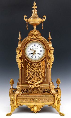 A LARGE GUSTAVE LEVY FRENCH EMPIRE GILDED BRONZE CLOCK