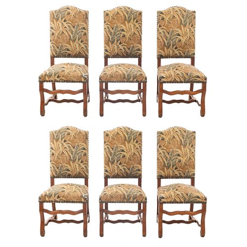 Lote of 6 chairs. France. 20th Century. Carved in oak. Closed backrests upholded in vegetable-motif upholstery.