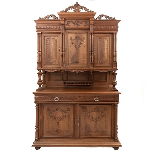 Buffet or Sideboard. France. 20th Century. Henri II. Carved in walnut. With 2 drawers and 5 doors. 100.3 x 59 x 22.4" (255 x 150 x 57 cm)