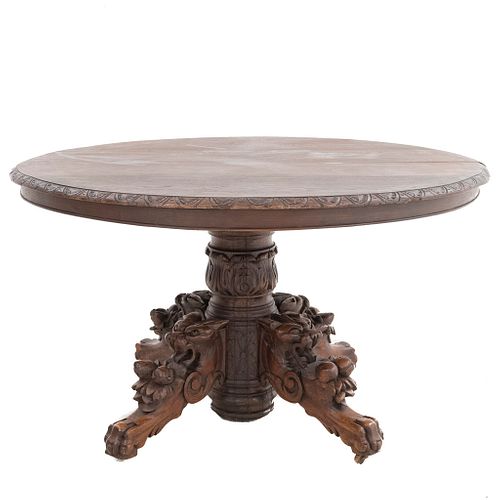 Pedestal Table. France. 20th Century. Henri II. Carved in oak. With oval tabletop and extendable system. 28 x 51 x 44" (71 x 130 x 112 cm)