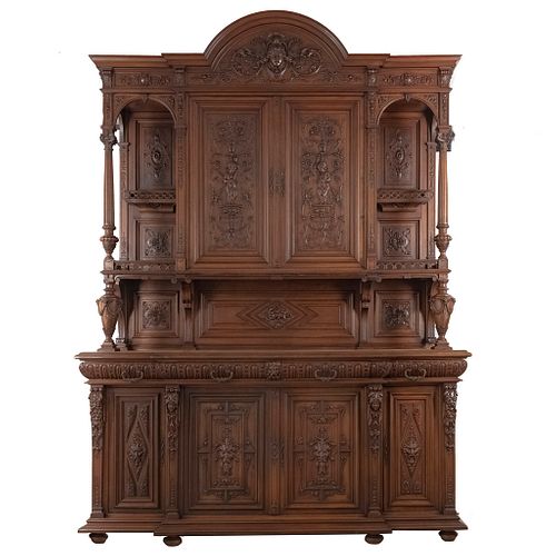 Buffet or Sideboard. France. 20th Century. Henri II. Carved in walnut. 2 shelves, 4 drawers, 6 doors. 114 x 81.4 x 26" (290 x 207 x 66 cm)