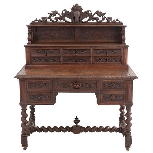 Desk. France. 20th Century. Carved in oak. 10 drawers with metal handles. 55 x 45 x 24" (140 x 115 x 62 cm)