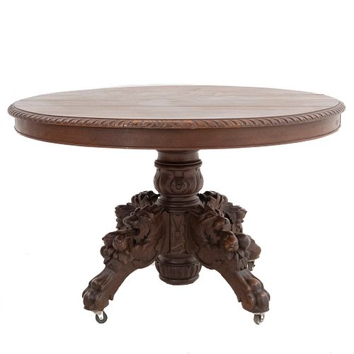 Pedestal Table. France. 20th Century. Henri II. Carved in oak. With oval tabletop and extendable system. 28.7 x 44.8 x 41.3" (73 x 114 x 105 cm)