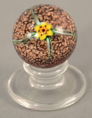 Charles Kaziun floral pedestal paperweight, yellow flower with gold flecked ground, signed with a small gold K under the flower. ht. 2 in. Provenance:
