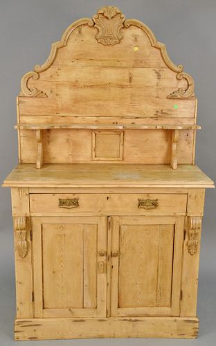 Pine sideboard with large back. ht. 72 1/2 in., wd. 42 in. Provenance: Former home of Mel Gibson, Old Mill Rd, Greenwich, CT