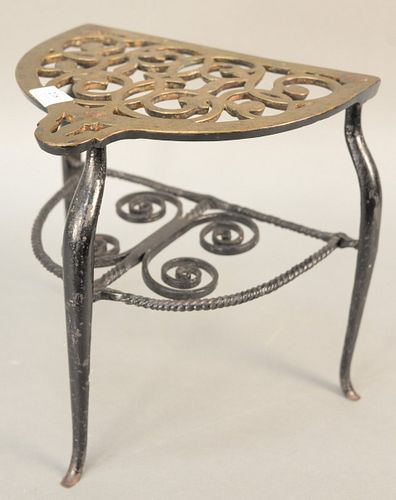 Brass and iron trivet pierced top with turned and scroll support. ht. 12 3/4 in. Provenance: The Estate of Ed Brenner, Short Hills N.J.