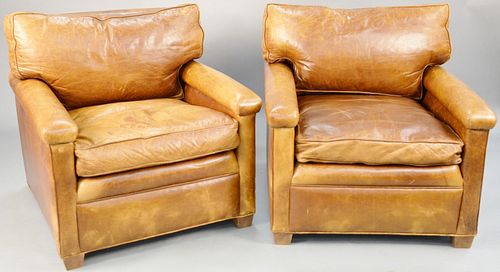 Pair of brown leather easy chairs. ht. 31 in., wd. 32 in., dp. 37 in. Provenance: Former home of Mel Gibson, Old Mill Rd, Greenwich, CT