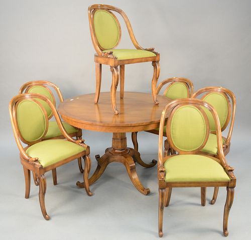 Six piece Baker dining set with round table and six chairs each with goose neck supports, with two extra 18" leaves. dia. 44 in. total top open: 44" x