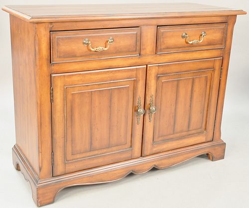 Contemporary cabinet having two drawers and two doors. ht. 38 in., wd. 51 in. Provenance: Former home of Mel Gibson, Old Mill Rd, Greenwich, CT