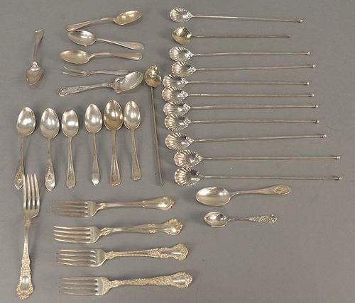 Sterling silver lot to include flatware and ice tea spoons. 22.3 t.oz.