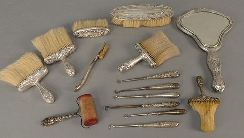 Group of sterling silver vanity items to include mirror, brushes, etc.