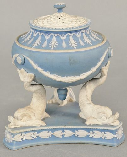 Wedgwood pale blue Jasper tripod urn with pierced cover, supported on dolphin legs, classical motifs throughout, Wedgwood stamp on bottom, wear consis