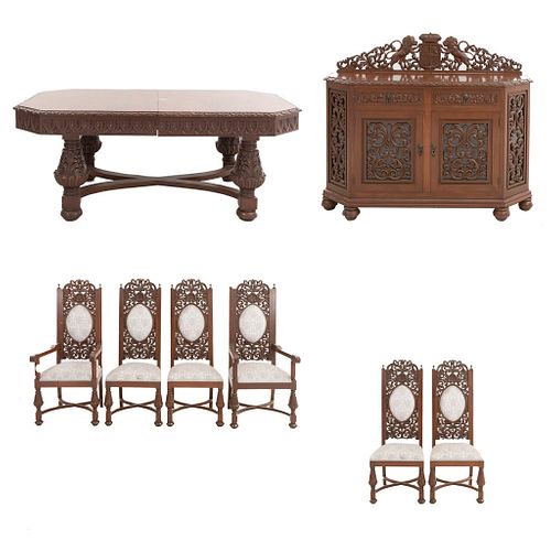Comedor. Siglo XX. En talla de madera. Consta de: Mesa, 4 sillas y 2 sillones y buffet. 122 x 145 x 49 cm. (mayor) Total de piezas: 8.