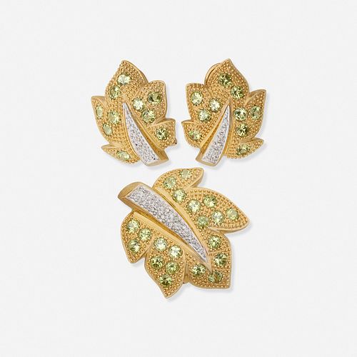 Suite of diamond and peridot leaf jewelry