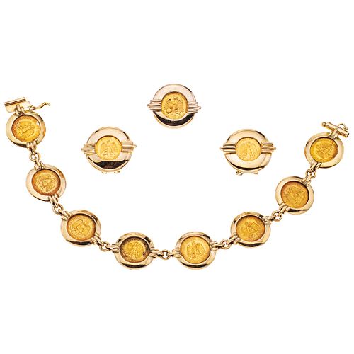 WRISTBAND, RING AND EARRINGS SET WITH DEMONETIZED COIN. 21.6K AND 14K YELLOW GOLD