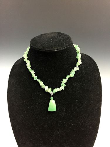 Chinese jade necklace with pendant.